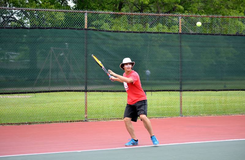 Ready to serve — Tilley hat and all